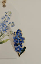 Forget-me-not pin with gift tag