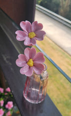 Singular pink ceramic flower