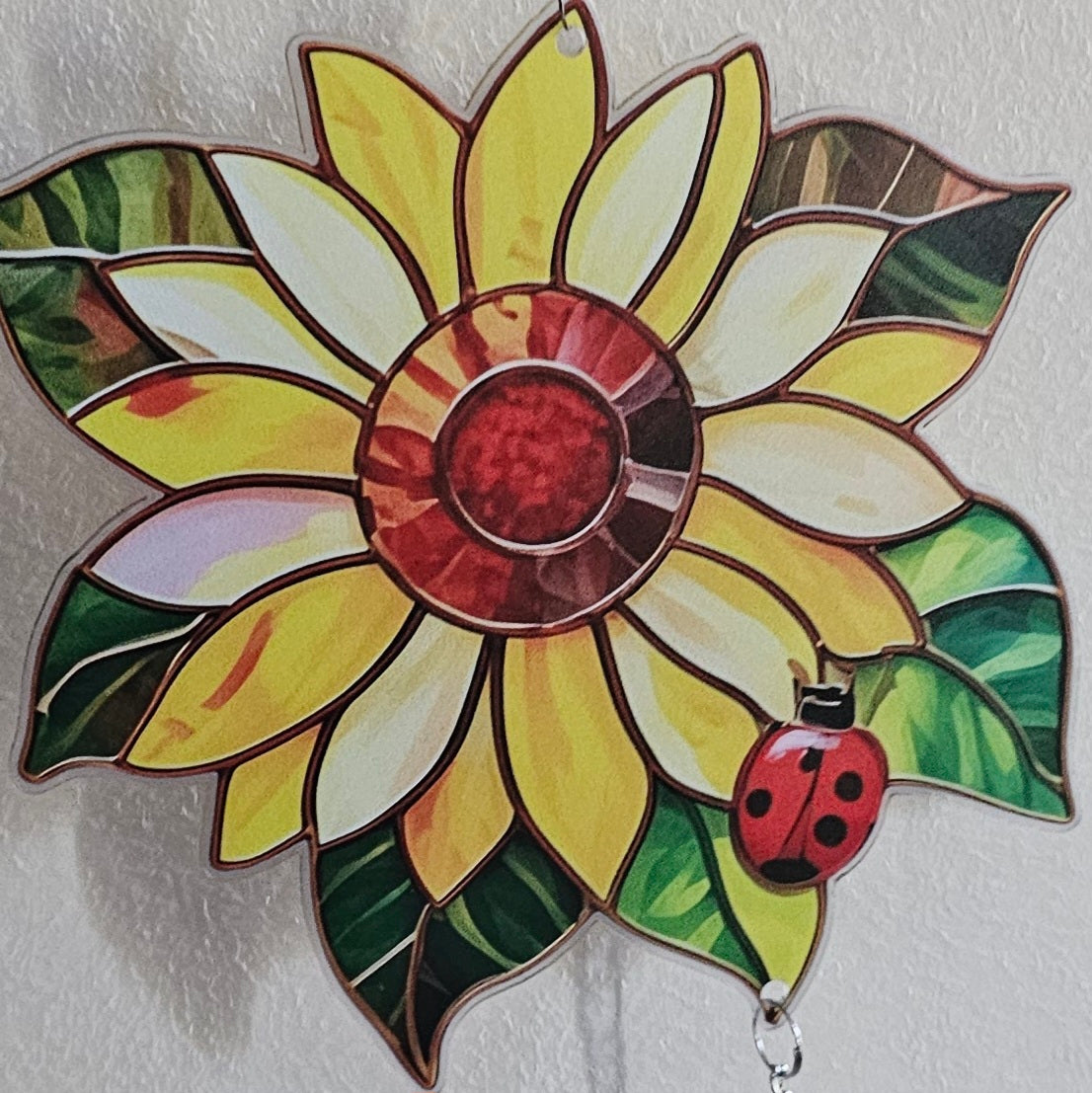 Sunflower hanging garden display with bell