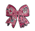 Pretty Pink bow pin, nurse/doctor themed.