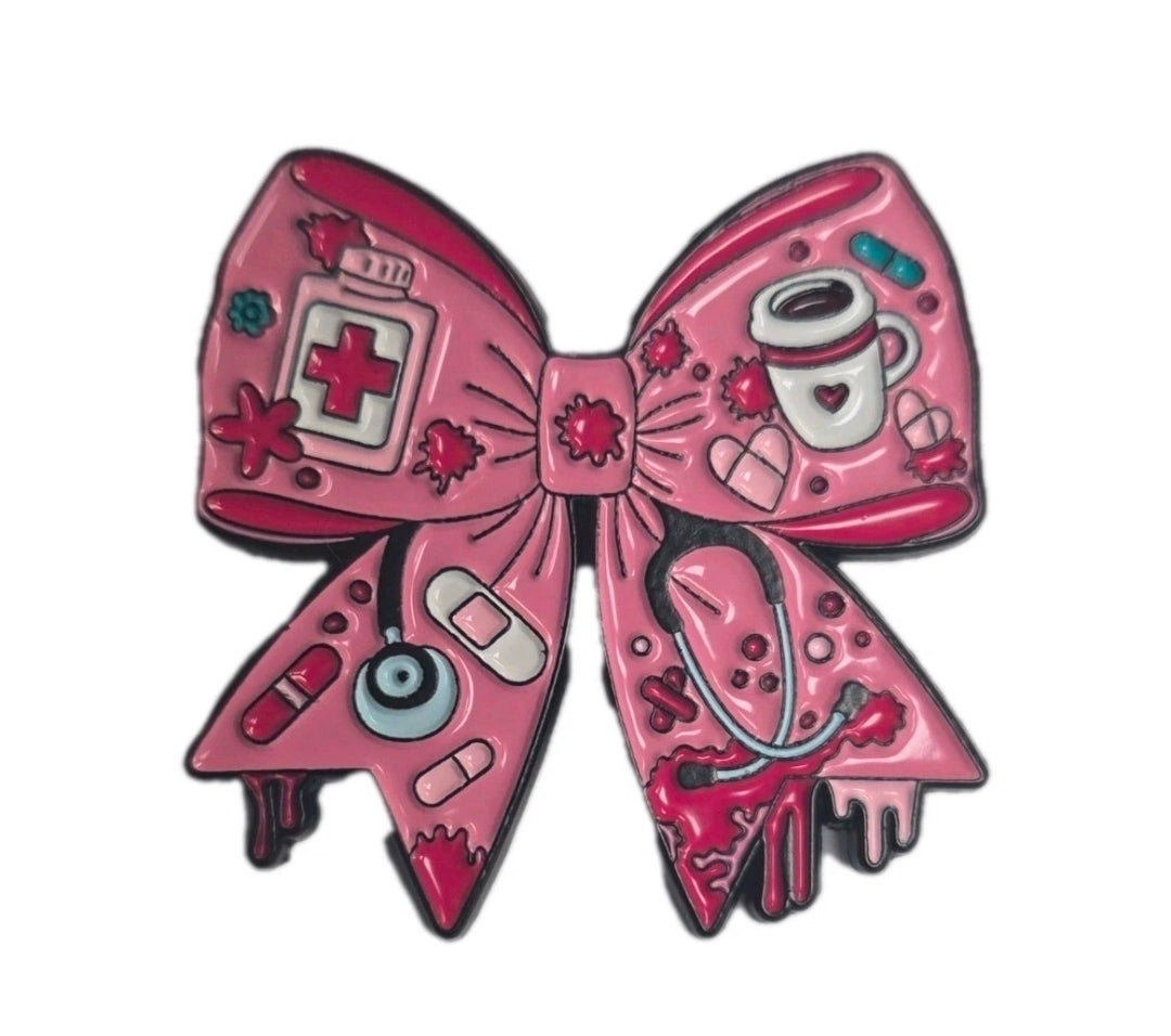 Pretty Pink bow pin, nurse/doctor themed.
