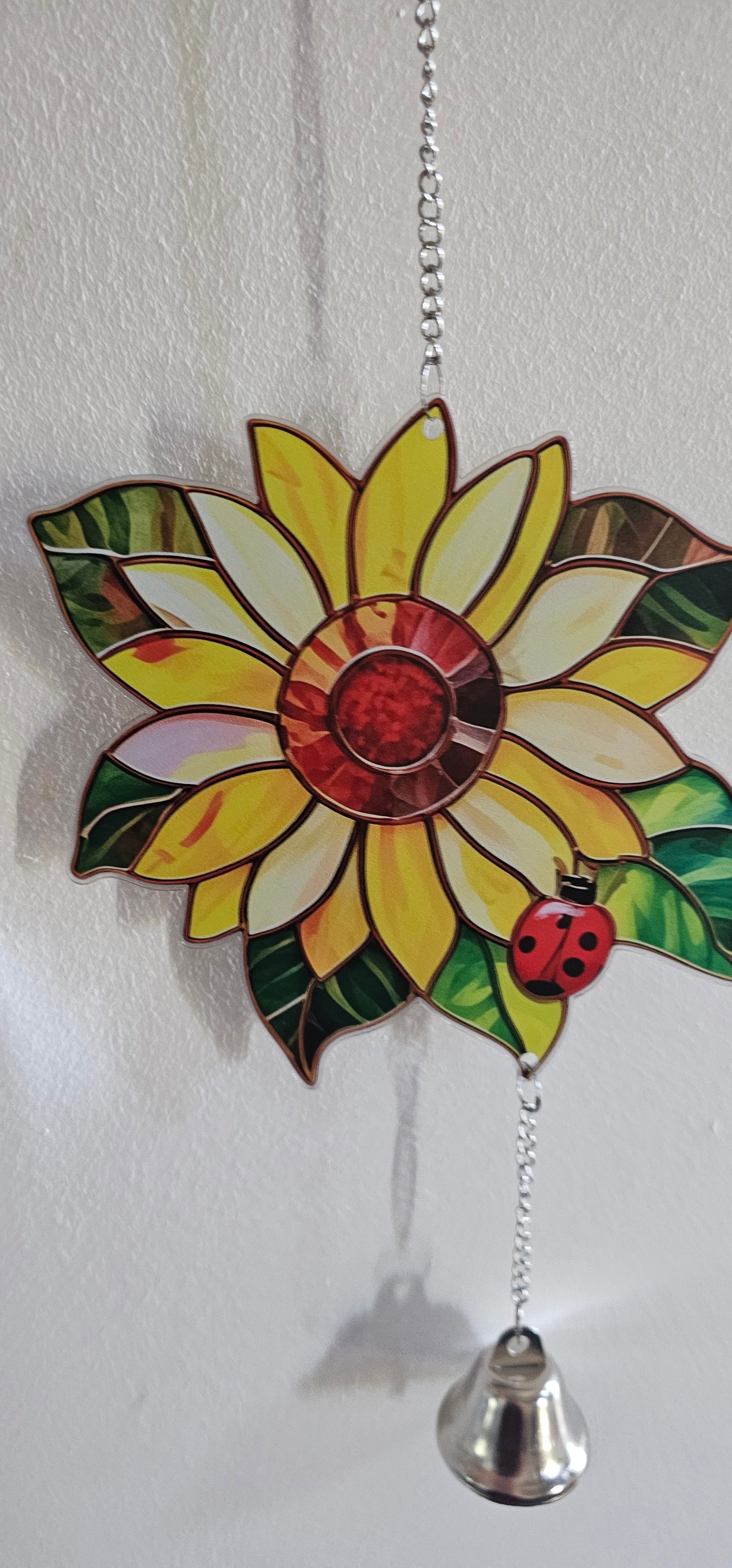 Sunflower hanging garden display with bell