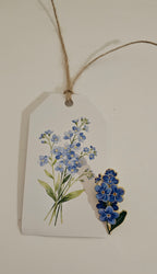 Forget-me-not pin with gift tag