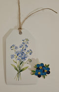 Forget-me-not pin with gift tag