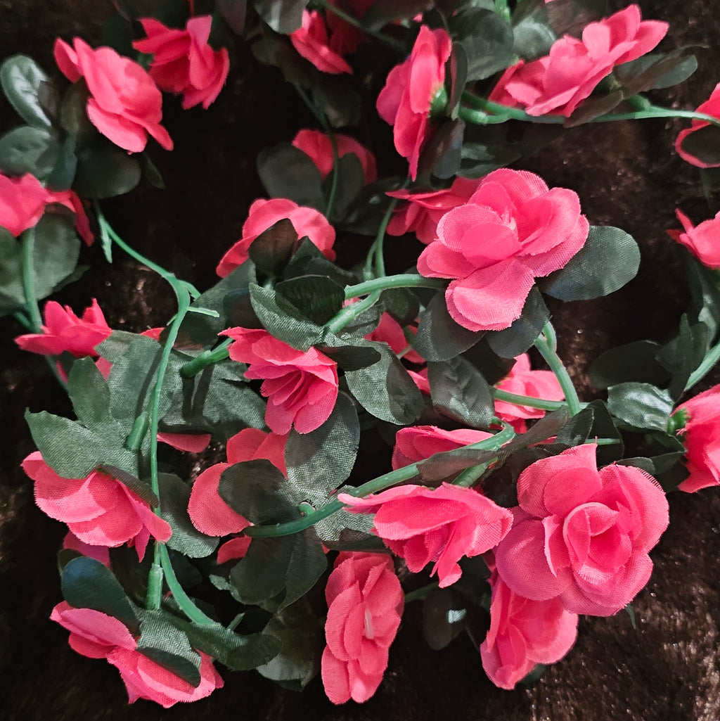 Guirlandes de fleurs artificielles roses