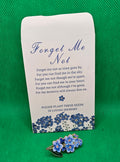 Forget-me-not pin with seed envelope