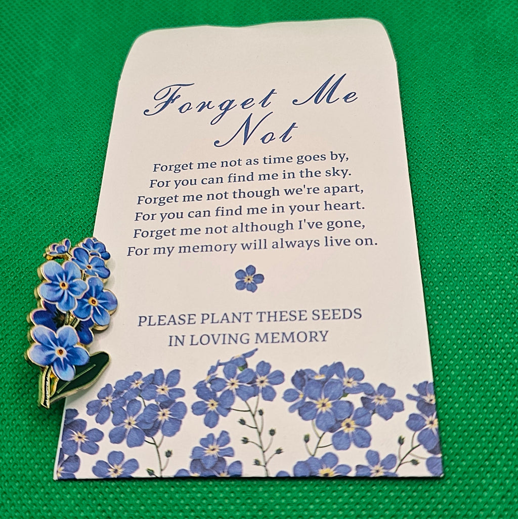 Forget-me-not pin with seed envelope