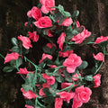 Guirlandes de fleurs artificielles roses